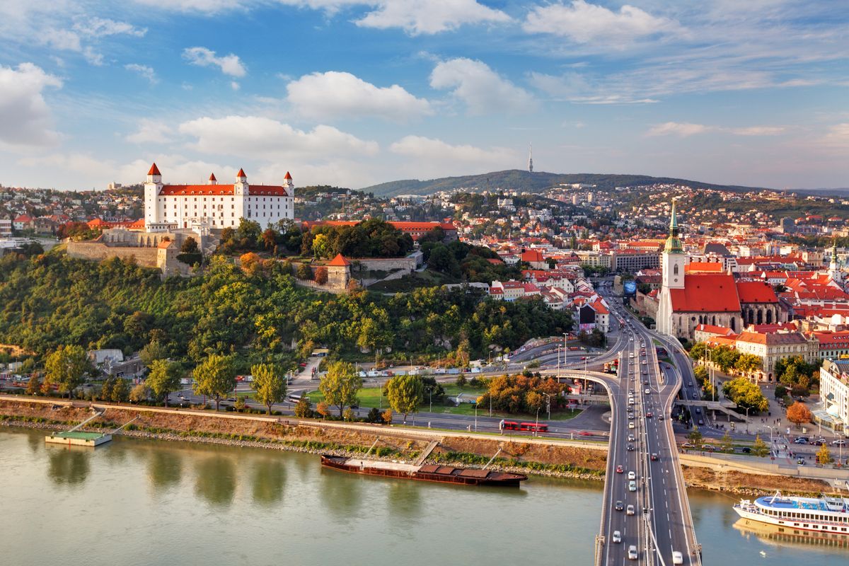 <p>Slovakia's capital sits snugly between Hungary and Austria along the banks of the Danube. Bratislava may be compact, but it packs a punch in terms of history and culture. The city's location has made it a melting pot of cultures since ancient times, and you can expect to see these influences play out in every corner. </p><p>There's a medieval and Gothic old town that buzzes with the sound of different languages around grand Baroque palaces built by Hungarian nobility alongside communist-era blocks and a unique futuristic bridge that reflect its more recent past. A highlight is the imposing Bratislava Castle, which dominates the skyline with its four turrets, standing on a rocky hill in the Little Carpathians and looking out across the Danube. </p><p>You can visit Bratislava on Good Housekeeping's Danube cruise, where you'll have time to visit the castle and wander the cobbled streets of the Old Town and along the promenade of the Danube riverbank, stopping for a coffee and admiring the views. </p><p><a class="body-btn-link" href="https://www.goodhousekeepingholidays.com/tours/danube">VISIT BRATISLAVA WITH GH</a></p>
