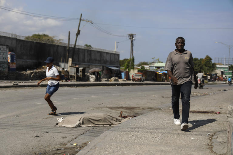 Haitians shot dead in street and there’s no one to take the corpses away