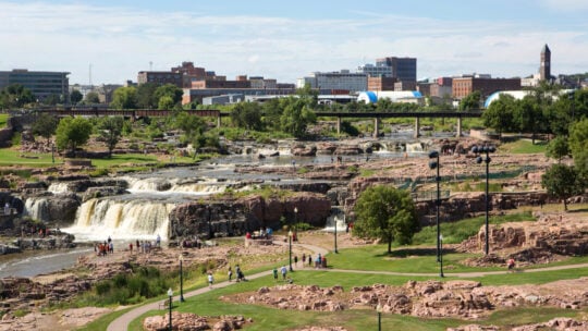 <p><span>Sioux Falls, South Dakota, may not be the first place you think of for a vacation, but its affordability and range of activities make it a hidden gem for travelers. The city’s must-see attraction is Falls Park, where stunning waterfalls provide a picturesque backdrop. For those looking to explore the great outdoors, the Sioux Falls Bike Trails offer scenic rides through the area. The city’s downtown area is creative, showcased through the SculptureWalk’s array of metal, glass, and wood art. For a small fee, the Butterfly House & Aquarium presents an immersive experience with nature. </span></p>