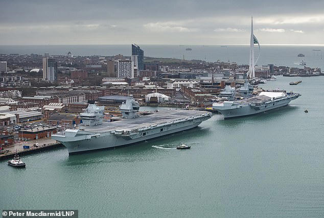 Royal Navy's flagship £3bn warship HMS Queen Elizabeth catches fire