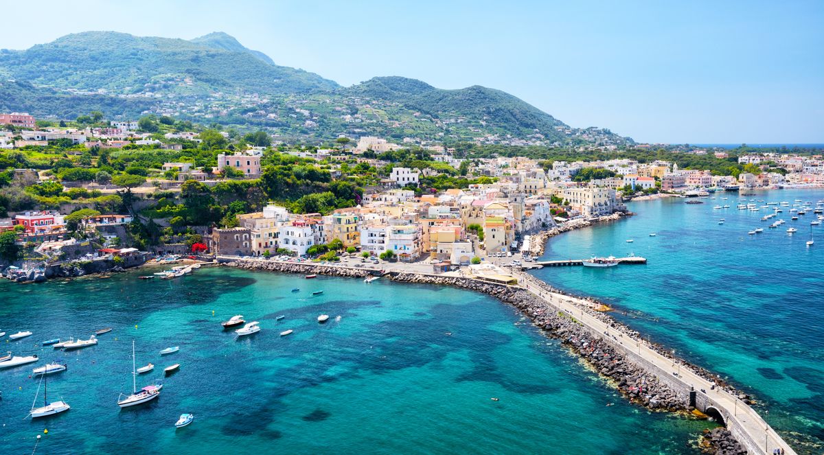 <p>We don’t have a bad word to say about any of the isles in the Neapolitan Archipelago, but less-frequented than its super-glamorous neighbour <a href="https://www.harpersbazaar.com/uk/travel/g43210044/capri-hotels/">Capri</a> is Ischia. This volcanic island in the Gulf of Naples has thermal waters, with rock pools heated by underground volcanic activity, Roman ruins and sandy beaches with panoramic views, including out to the mediaeval Aragonese Castle, on a small tidal island but connected by a stone bridge. One of its most picturesque towns is Lacco Ameno, at the foot of Mount Epomeo. Even less visited by tourists is the colourful island of Procida, Italy’s official Capital of Culture a couple of years ago.</p><p><strong>Where to stay: </strong>For an unforgettable setting, book a stay <a href="https://www.mrandmrssmith.com/luxury-hotels/faro-punta-imperatore">Faro Punta Imperatore</a>, located within a lighthouse in a remote corner of Capri – the views are as incredible as you’d hope.</p>