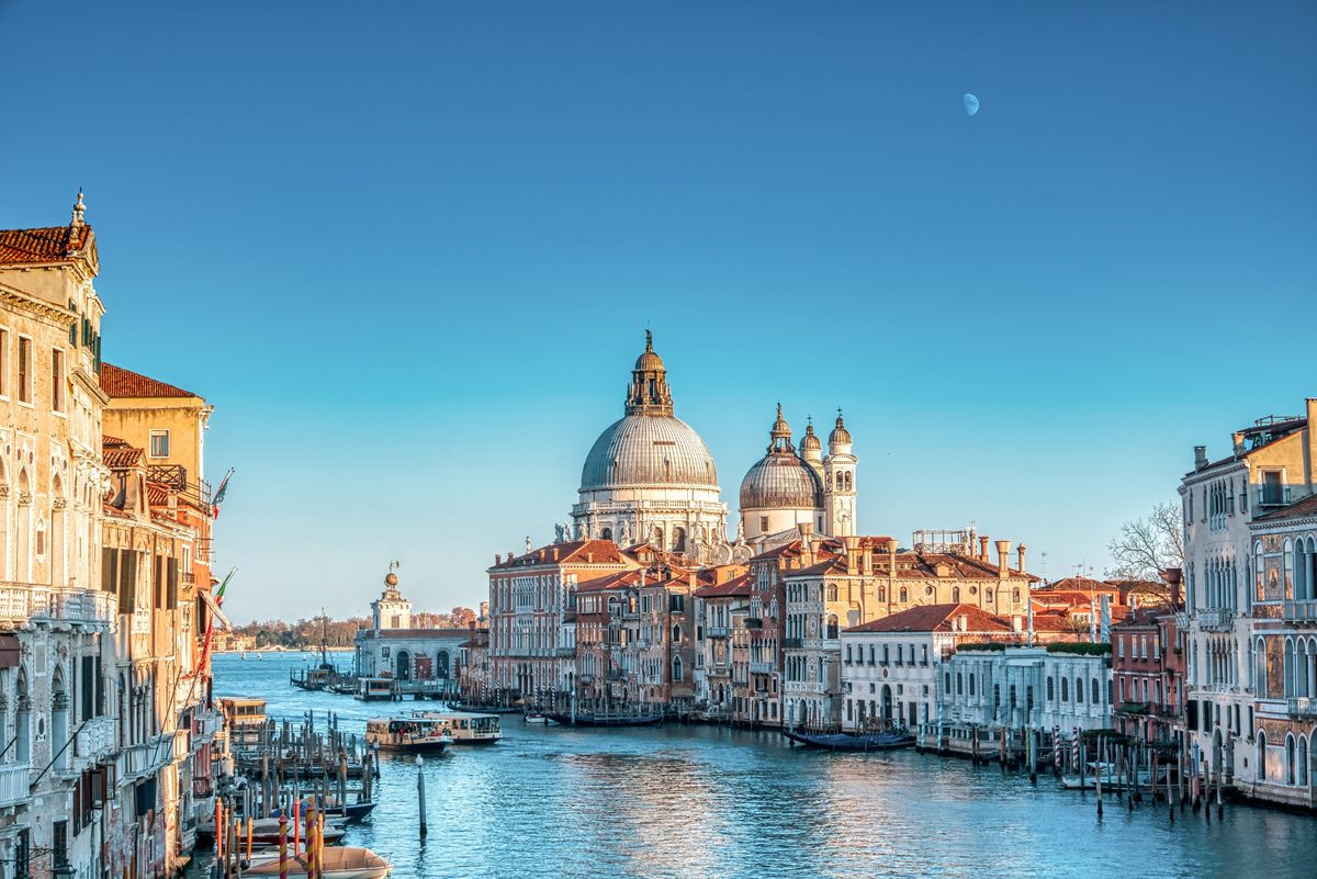 <p>Italy’s great cities are all spectacular in their own right but few capture the imagination like <a href="https://www.harpersbazaar.com/uk/travel/g43209388/best-hotels-venice/">Venice</a> does. The Floating City is adrift in the Adriatic, built on more than 100 islands in the Venetian Lagoon. There are must-do tourist activities, whether it’s ordering a Bellini at Harry’s bar, heading over to the Cipriani for a dip in its Olympic-size swimming pool, or parting with a small fortune for an espresso at one of the two iconic cafés on St Mark’s Square – Caffè Florian has been serving coffee on this site since 1720. For a more local feel, don’t miss art district Dorsoduro, or visit other islands, such as colourful Burano.</p><p><strong>Where to stay:</strong> Back in 2014, Amal and George Clooney staged some rather spectacular nuptials in Italy and one backdrop was provided by the <a href="https://www.aman.com/hotels/aman-venice">Aman</a> in Venice, a converted palazzo with a mesmerising view of the Grand Canal.</p>