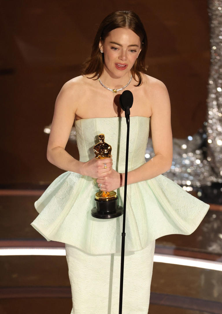 Emma Stone thanked her 2-year-old daughter Louise while accepting her Oscar for best actress on Sunday night. REUTERS