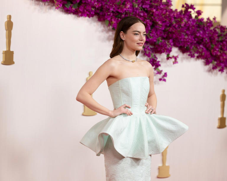 She stunned in a mint green Louis Vuitton gown.