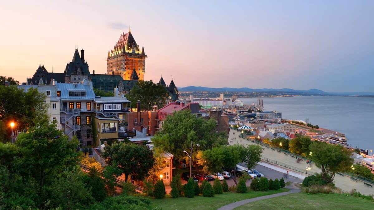 <p>Quebec City, the heart of French Canada, is a living mosaic of history and culture. Founded in 1608 by French explorer Samuel de Champlain, it is one of North America’s oldest and most beautiful cities. </p><p>Its strategic location atop Cape Diamond overlooking the St. Lawrence River made it a key military stronghold, evident in the formidable ramparts and citadels that still surround the city today. </p><p>The star-shaped Citadelle of Quebec, an active military installation and the official residence of the Canadian monarch, shows off the city’s military significance.</p><p>The Historic District of Old Quebec, a UNESCO World Heritage site, is a testament to the city’s rich past, boasting well-preserved 17th and 18th-century buildings. Walking through its narrow streets, visitors are transported to a bygone era, with the iconic Château Frontenac hotel presiding over the cityscape like a fairy-tale castle. </p><p>Quebec City’s enduring French identity, evident in its language, cuisine, and architecture, offers a unique European charm in North America, making it an unparalleled destination for history enthusiasts.</p>
