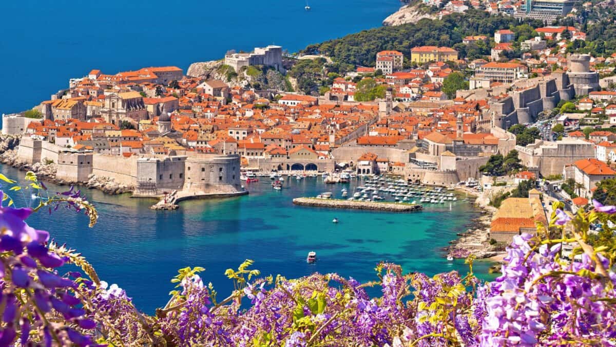 <p>A medieval walled city on the Adriatic Sea, known for its historic Old Town and ancient city walls, <a href="https://www.flannelsorflipflops.com/dubrovnik-cruise-port/">Dubrovnik</a> was a major maritime trade center during the Middle Ages known as the Republic of Ragusa.</p><p>Recognized as a UNESCO World Heritage site, the city’s rich history is evident in its Renaissance and Baroque architecture, including Sponza Palace and Rector’s Palace.</p><p>Along with its incredible history and beautiful town, Dubrovnik has beautiful beaches where you can soak up the Mediterranean sun while in port for the day. </p>