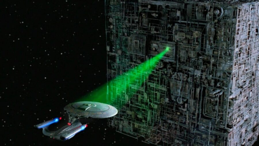 <p>To understand why this is significant, it’s important to revisit the Star Trek: The Next Generation episode which introduced the Borg. Though the series planted seeds for their appearance back in season 1 episode “The Neutral Zone,” we didn’t actually see them until the season 2 episode “Q Who.” All we really know about the Borg in this episode is that they were located very far away and that (thanks to their ability to assimilate people and technology) the Enterprise was no match for them.</p>