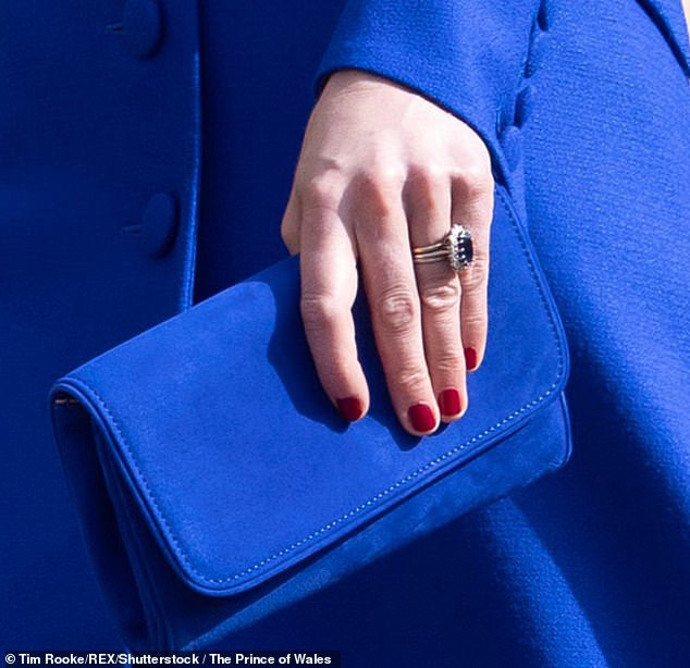 dr martin scurr: why kate may have taken off her wedding rings for that mother's day photograph