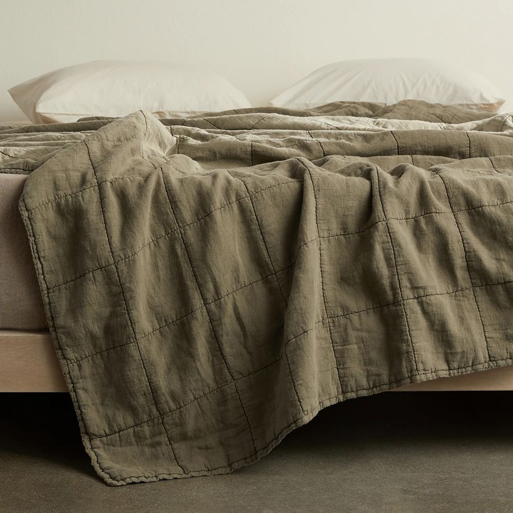 The 14 Best Bed Quilts for More Style and Less Sweating While You Sleep