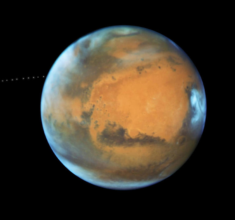 A photograph of Mars, the fourth planet from the Sun, taken by the Hubble Space Telescope in 2017.