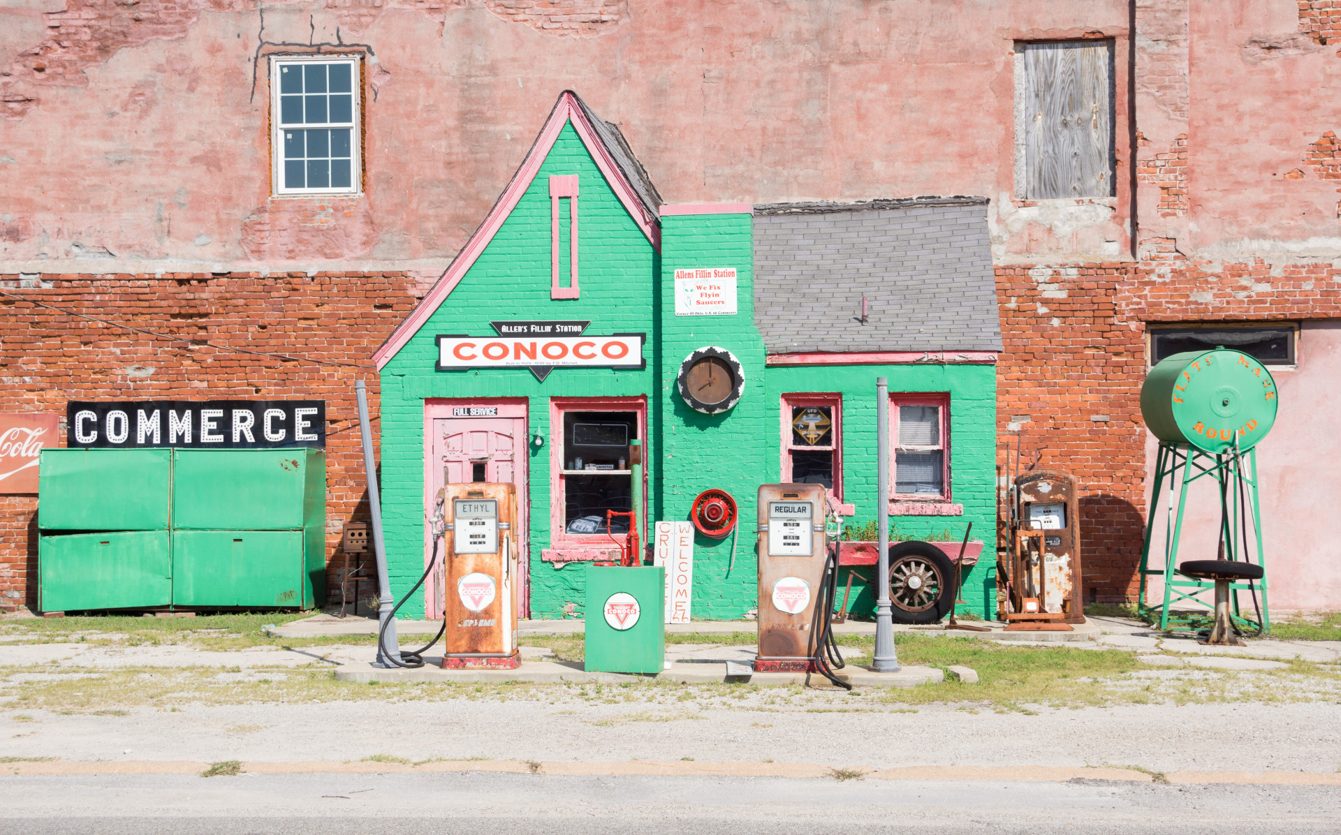 The historic and carefully preserved Conoco garage replete with rusting, long retired pumps. It stands in the town of Commerce.