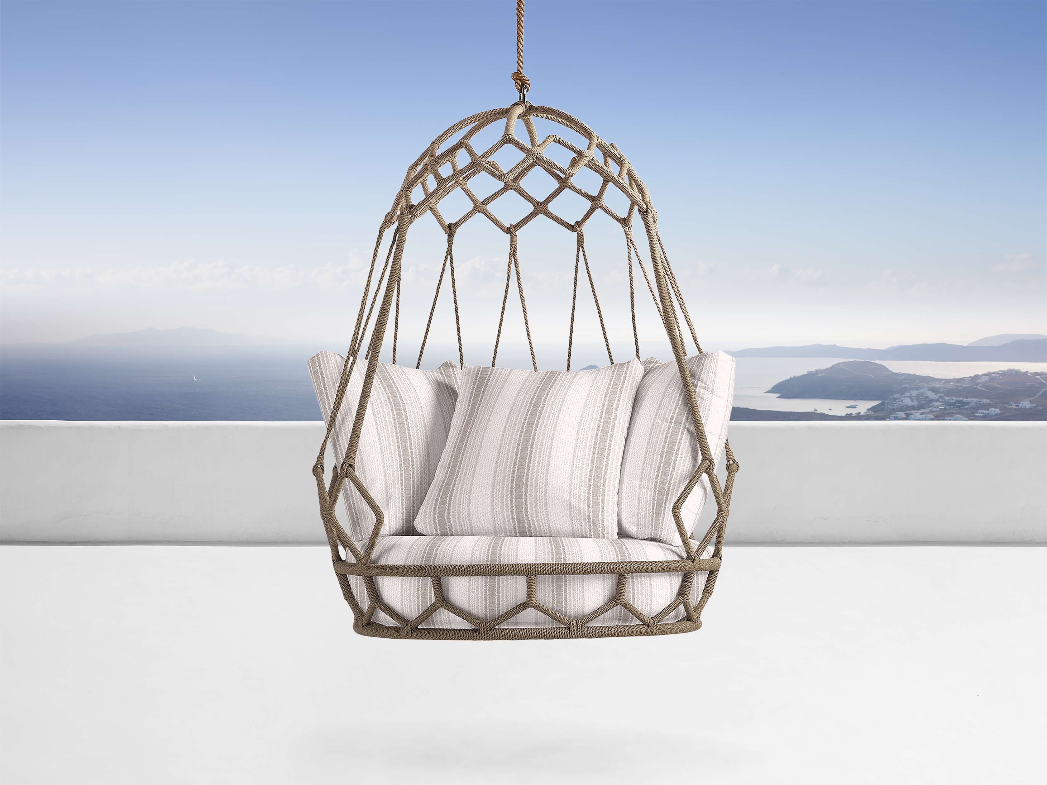 These 20 Outdoor Hanging Chairs Will Help You Swing into Summer