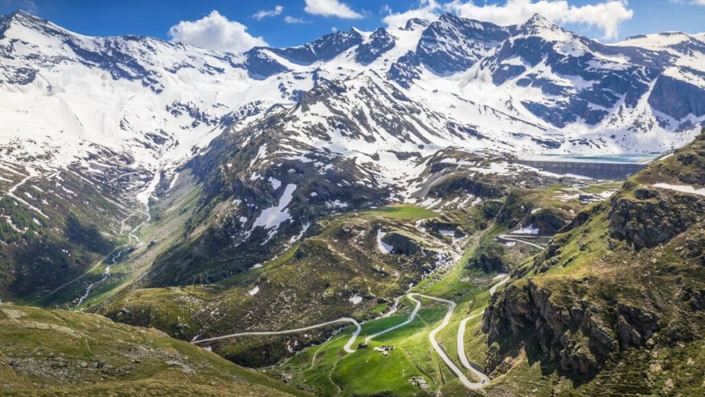 <p>Travel through the French Alps on the Route des Grandes Alpes. This 425-mile journey from Lake Geneva to the Mediterranean Sea passes through many mountains and <a href="https://sparknomad.com/tayrona-colombia/">national parks</a>, each offering breathtaking views of the high peaks.</p>