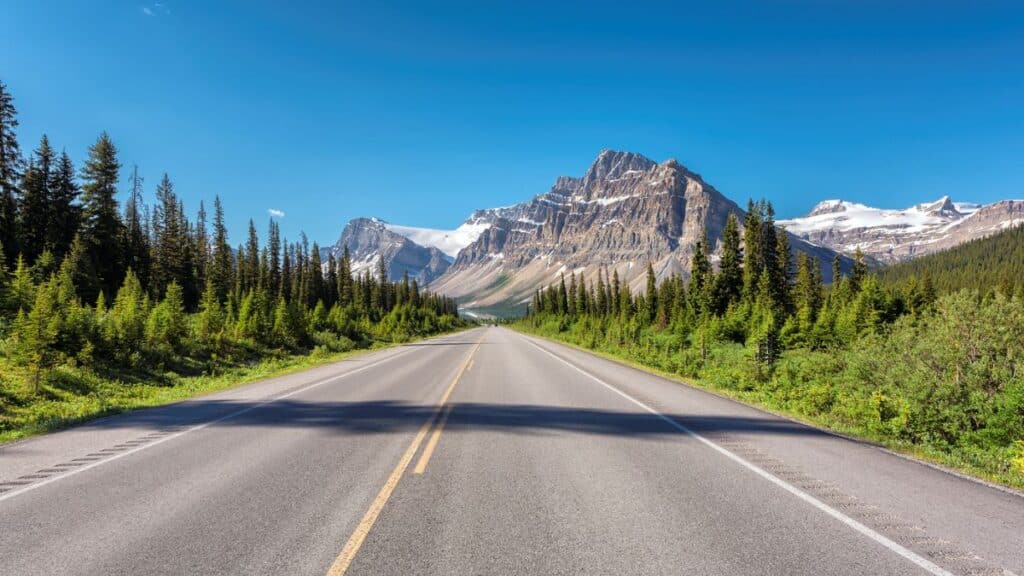 <p>The Jasper to Banff drive in Canada is a 144-mile <a href="https://www.thewaywardhome.com/12-solo-road-trip-hacks-for-a-safe-and-exciting-adventure/">road trip</a> through the heart of the Rockies. It has the Columbia Icefield and Lake Louise; you might also see animals alongside a backdrop of mountains.</p>