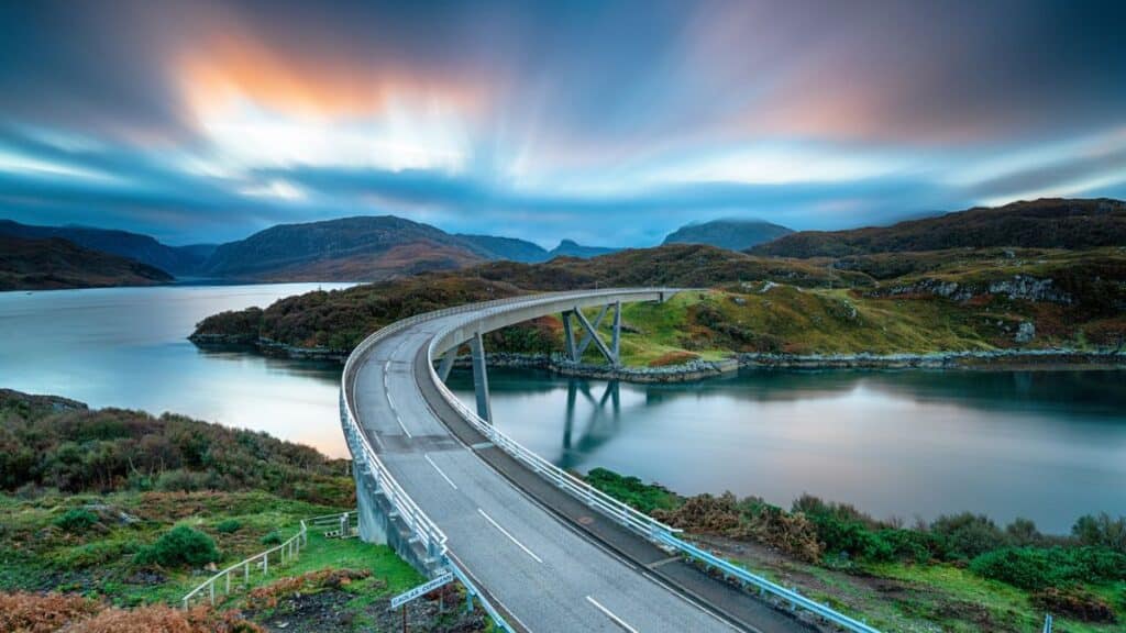 <p>Scotland’s answer to Route 66, the North Coast 500, winds through 500 miles of the Scottish Highlands. It’s a mix of deep lochs, tiny fishing villages, and castles, surrounded by a mystical atmosphere that will transport you to another dimension.</p>