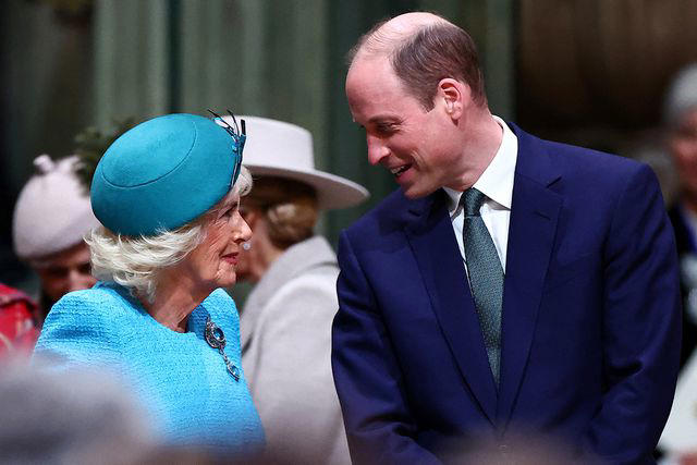 HENRY NICHOLLS/POOL/AFP via Getty From left: Queen Camilla and Prince William attend the Commonwealth Day service on March 11, 2024