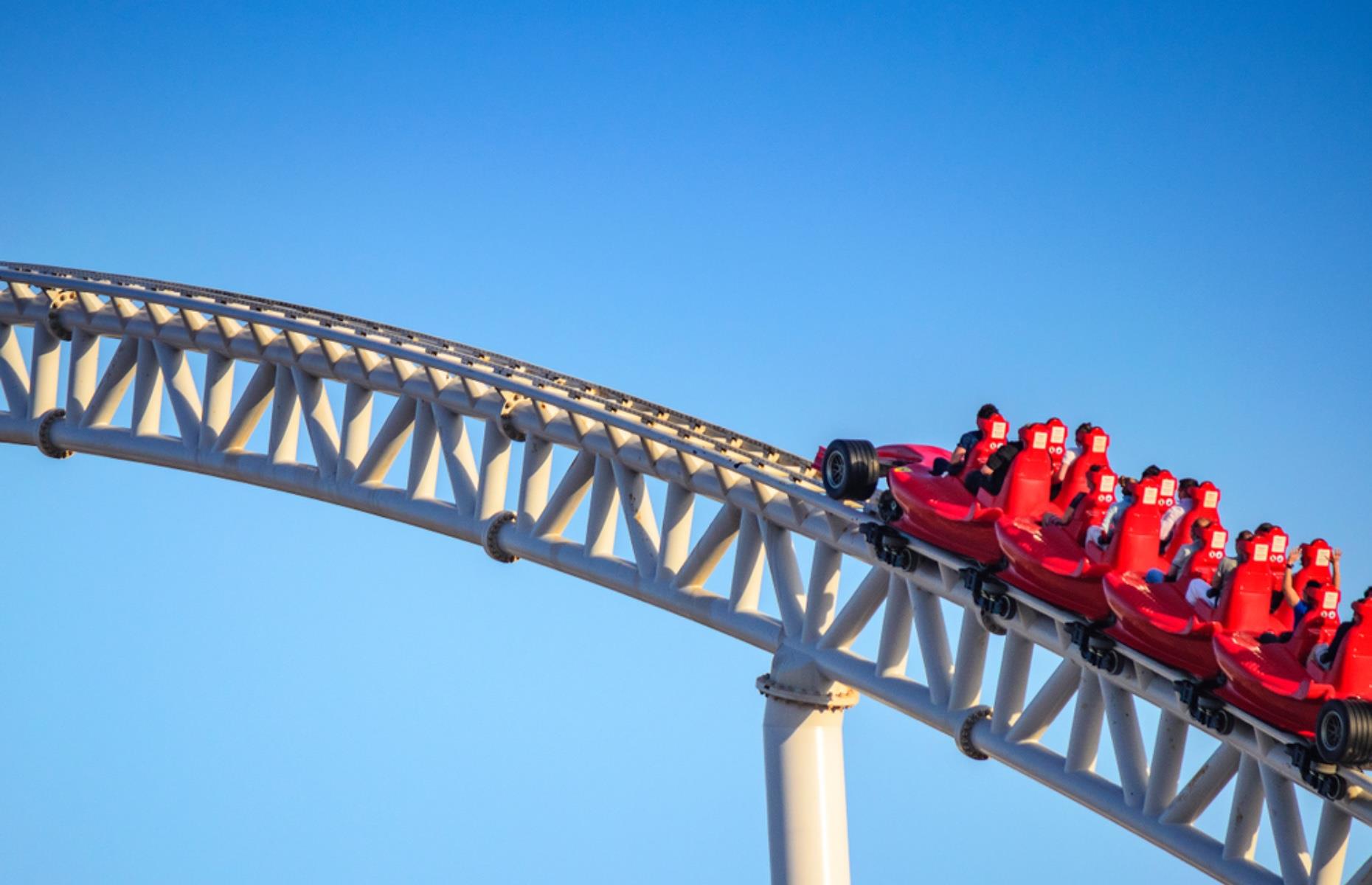 <p>The fastest roller coaster in the world right now has a mind-bending top speed of 149.1 miles per hour. We're dizzy just thinking about it! </p>  <p>The hydraulic launch system gets to its top speed quickly too – in 4.9 seconds, to be precise. It goes so fast that passengers have to wear protective glasses.</p>  <p>The train carriages are shaped like Formula One Ferrari racing cars and the track itself is full of tight turns and drops, reminiscent of a Grand Prix course.</p>