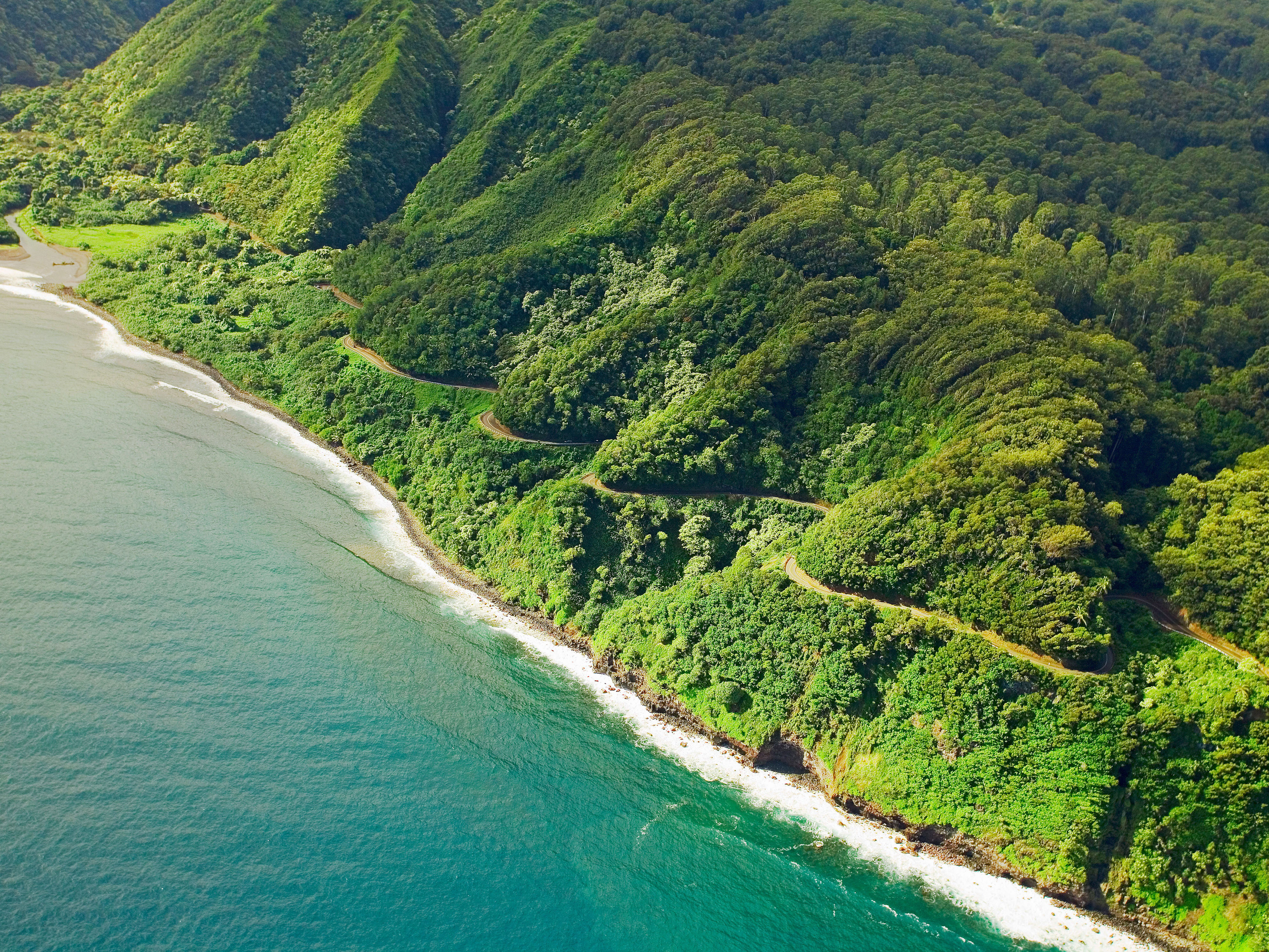 <p>Not all roads are created equal, and this 64-mile stretch, known as the Hana Highway or Road to Hana, is one of the most thrilling. It snakes along the northeastern coast of <a href="https://www.cntraveler.com/destinations/maui?mbid=synd_msn_rss&utm_source=msn&utm_medium=syndication">Maui</a> with 600 curvy bends and 50-plus-wait-your-turn bridges (we suggest a Jeep Wrangler for this journey) taking you past towering coastal cliffs, plunging waterfalls, dense jungle, and panoramic views of the Pacific Ocean.</p> <p><strong>Where to stop:</strong> With its bamboo canopy, Waikamoi Nature Trail is worth a pitstop, even more so as it’s often overlooked. The dreamy hike here takes less than a mile but remember to pack sturdy shoes if it’s wet, as the trail can be slippery. The mystical Waikani Falls and volcanic <a href="https://www.cntraveler.com/gallery/most-beautiful-black-sand-beaches-in-the-world?mbid=synd_msn_rss&utm_source=msn&utm_medium=syndication">black sand beaches</a> at Wai’ainapanapa State Park are both unmissable.</p> <p><strong>Where to eat:</strong> The sleepy <a href="https://www.twinfallsmaui.net/farm-stand/">Wailele farm stand at Twin Falls</a> is a great spot: try the cold brew, Maui-grown coffee, or some of the farm’s all-natural, dairy-free coconut ice cream.</p> <p><strong>Where to stay:</strong> The blissed-out, television-free <a href="https://www.cntraveler.com/hotels/united-states/hana/travaasa-hana-maui?mbid=synd_msn_rss&utm_source=msn&utm_medium=syndication">Travaasa Hana</a> allows you to decompress, island-style. Try everything from stand up paddle boarding to coconut husking, or just book a traditional Hawaiian Lomilomi healing massage at the spa. There’s also the <a href="https://www.cntraveler.com/hotels/hana/hana-maui-resort?mbid=synd_msn_rss&utm_source=msn&utm_medium=syndication">Hāna-Maui Resort</a>, where you can book an Ocean Bungalow and soak in the sunset.</p><p>Sign up to receive the latest news, expert tips, and inspiration on all things travel</p><a href="https://www.cntraveler.com/newsletter/the-daily?sourceCode=msnsend">Inspire Me</a>