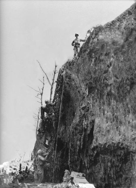 <p>It was this perilously steep cliff that inspired the nickname for the area - "Hacksaw Ridge." There's no conclusive answer as to why this was the nickname the American servicemen agreed upon, but there are certainly no shortage of <a href="https://www.quora.com/Why-is-the-movie-called-Hacksaw-Ridge-Why-is-the-battle-ridge-called-Hacksaw-Ridge" rel="noopener">theories</a>.</p> <p>One, in particular, refers to the physical appearance of the area to the approaching troops. The north side of the escarpment has two rock faces - Hacksaw Ridge and Needle Rock - with a gap in the middle. This apparently looks like the notch in a hacksaw, influencing the name.</p> <p>Another theory states that the name was more metaphorical than physical. A saw represents the back and forth nature of the fighting, while the tool's teeth reference the soldiers and Marines who lost their lives.</p>