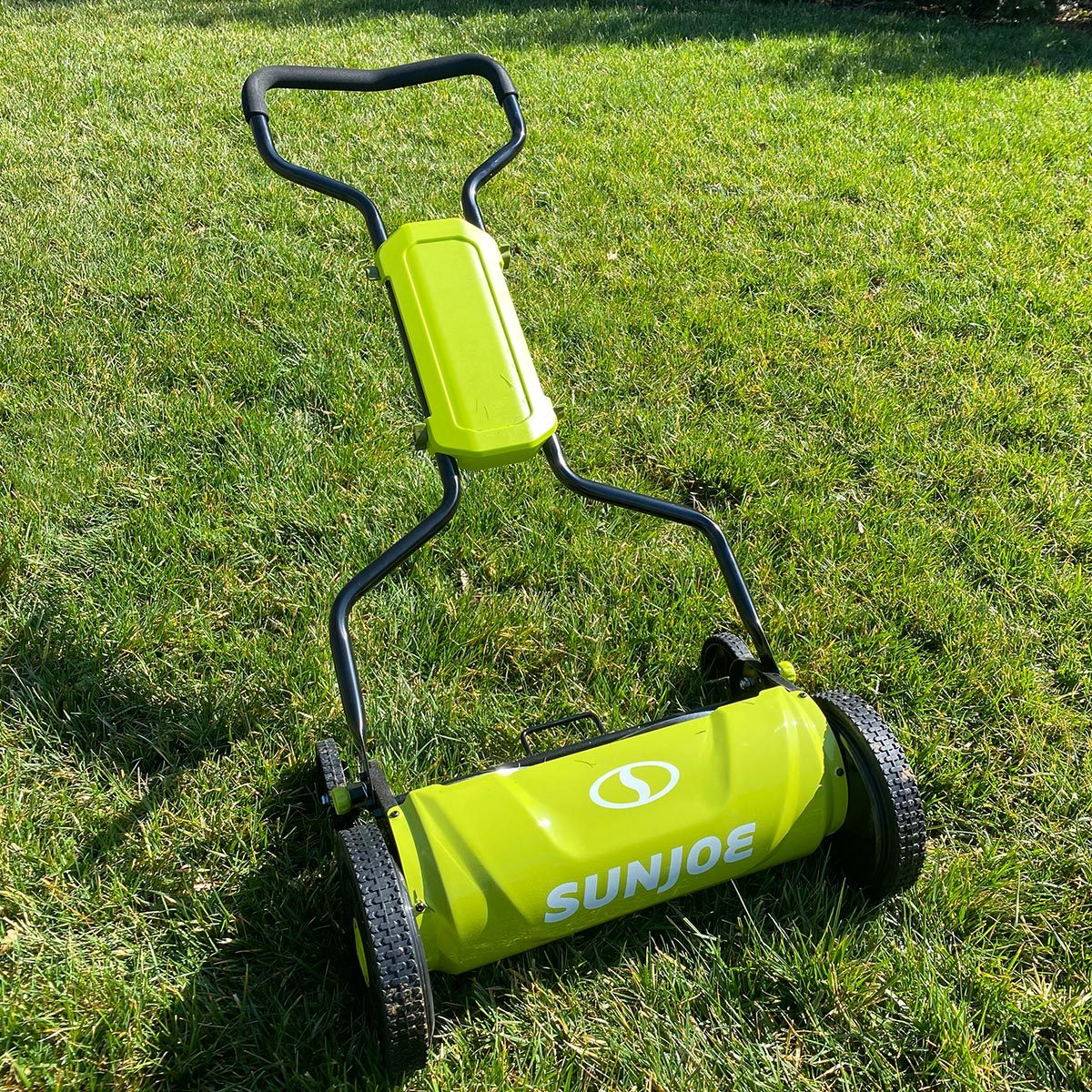 <h3>Sun Joe MJ800M Reel Mower</h3> <p>For seniors like my parents, I recommend the <a href="https://www.campingworld.com/sun-joe-mj1800m-18-inch-quad-wheel-5-position-razor-sharp-cutting-blade-silent-push-reel-mower--130756.html" rel="noopener">Sun Joe MJ800M Reel Mower</a>. This reel mower has a nice ergonomic grip with padding that makes controlling the mower super easy. The padded handle is designed to "give" a little when squeezing and pushing and overall requires less hand strength to operate.</p> <p>I also love that the Sun Joe MJ800M reel mower has four sturdy wheels that allow it to stand up straight. This means no bending over to pick the mower up. Plus, it stores similarly to a vacuum. This stops my elderly parents from leaning over to pick up a heavy mower and prevents them from trying to pick it up and store it on a hook on the wall.</p> <p><strong>Pros</strong></p> <ul> <li>Quad wheels allow it to stand up</li> <li>Comfortable hand grips</li> <li>Nice design</li> </ul> <p><strong>Cons</strong></p> <ul> <li>Heavier</li> <li>Plastic wheels</li> </ul> <p class="listicle-page__cta-button-shop"><a class="shop-btn" href="https://www.campingworld.com/sun-joe-mj1800m-18-inch-quad-wheel-5-position-razor-sharp-cutting-blade-silent-push-reel-mower--130756.html">Shop on Camping World</a></p> <p class="listicle-page__cta-button-shop"><a class="shop-btn" href="https://www.cabelas.com/shop/en/sun-joe-18-quad-wheel-5-position-silent-push-reel-mower">Shop on Cabela's</a></p> <p class="listicle-page__cta-button-shop"><a class="shop-btn" href="https://www.basspro.com/shop/en/sun-joe-18-quad-wheel-5-position-silent-push-reel-mower">Shop on Bass Pro Shops</a></p>  <h2 class="">What to Look for When Buying a Reel Mower</h2> <p>A traditional rotary <a href="https://www.familyhandyman.com/article/lawn-mower-buying-guide/">lawn mower</a> uses a flat, spinning blade that <a href="https://www.familyhandyman.com/article/lawn-cutting-dos-and-donts/">cuts grass</a> the way a machete chops tall grass in a field. By contrast, a reel mower (sometimes called a cylinder mower) functions more like a pair of scissors. Blades of grass are caught and cut between the spinning reel (the curved metal that resembles a strand of DNA) and a fixed horizontal blade called the cutting bar. The resulting clean, precise snip makes for healthier, more attractive lawns. That's why reel mowers are frequently the machines of choice for golf courses.</p> <p>Reel mowers have a reputation for being "old school" and quite frankly, it is well deserved. But reel mowers have a ton of qualities besides nostalgia that give them relevance in the highly technological age we live in today. Reel mowers don't require any external power source, are inexpensive and require very little maintenance.</p> <p>"The advantages of a reel lawn mower include a superior quality of cut and the ability to mow at very low heights, such as golf course putting greens," says Bob Mann, Senior Director of Technical & Regulatory Affairs at the <a href="https://www.landscapeprofessionals.org/" rel="noopener">National Association of Landscape Professionals</a>. "The chief disadvantage is that they are very difficult to maintain, requiring daily adjustments in order to cut correctly and require highly specialized and very expensive sharpening equipment making their use cost prohibitive."</p> <p>Here are some things you should look for when making a reel mower purchase:</p> <ul> <li><strong>Cutting width: </strong>When it comes to how much time you spend mowing your grass, cutting width is a huge part of the equation. Wider is better to reduce cutting time and make fewer passes. With reel mowers, cutting width also means more resistance and a more difficult push.</li> <li><strong>Cutting height: </strong>Reel mowers are great for warm-season grasses that require more frequent cutting to keep them short. Look for a reel mower with a nice cutting height range, down to about an inch or so of height.</li> <li><strong>Weight: </strong>Weight is truly a double-edged sword with reel lawn mowers. It makes the mowing experience heavier when you have more weight but also helps the mower make it over bumps in the grass. I prefer mowers with a bit of weight.</li> <li><strong>Usability: </strong>Having a comfortable, easy-to-push reel mower is an absolute must. Once you get started using a reel mower, it can be a super pleasant and satisfying experience if the mower has the right features.</li> </ul> <h2>Why You Should Trust Us</h2> <p>My partner and I have tested over 100 lawn mowers at <a href="https://www.thelawnreview.com" rel="noopener noreferrer">The Lawn Review</a>. From <a href="https://www.familyhandyman.com/article/toro-timecutter-ss4225-lawn-mower-review/" rel="noopener noreferrer">zero-turn mowers</a> to <a href="https://www.familyhandyman.com/list/best-robot-lawn-mowers/" rel="noopener noreferrer">robot mowers</a> and everything in between, we have tested just about every mower on the market. We've reviewed battery-powered mowers by walking them around in my neighborhood until they've died (which was miles). I've also done side-by-side comparisons of robot mowers in my yard to see which ones provide the best cut and can handle difficult terrain. Furthermore, I've mowed hundreds of lawns as a former owner of a landscaping company. Needless to say, I know a thing or two about mowers.</p> <h2>Dozens of Miles Walked While Testing Reel Mowers</h2> <p>I picked these reel mowers for testing for a few reasons. For starters, many of these are from really high-quality brands like Fiskars. Fiskars have made super strong lawn and <a href="https://www.familyhandyman.com/list/must-have-gardening-tools/">garden tools</a> for generations. Other brands are extremely popular, like Sun Joe and Earthwise, and sell an absurd amount of inexpensive, quality products on Amazon.</p> <p>These reel mowers are all generally the same size and have many of the same features, making a side-by-side comparison and ranking system relatively easy. Each mower has a handful of distinct features that make it suited for a specific yard type, personality type or grass type.</p> <h2>FAQ</h2> <h3>Do you sharpen reel mower blades?</h3> <p>Yes, reel mower blades generally need to be sharpened every year.</p> <h3>Are reel mowers hard to push?</h3> <p>Reel mowers are not hard to push if the grass is maintained at an appropriate height. They are a good workout and present some opposing force, but they are not difficult to operate.</p> <h3>How long of grass can a reel mower cut?</h3> <p>Reel mowers can cut grass up to 4 inches tall. To cut taller grasses, the height adjustment needs to be at the maximum end of the range and the lawn needs to be cut more frequently.</p>