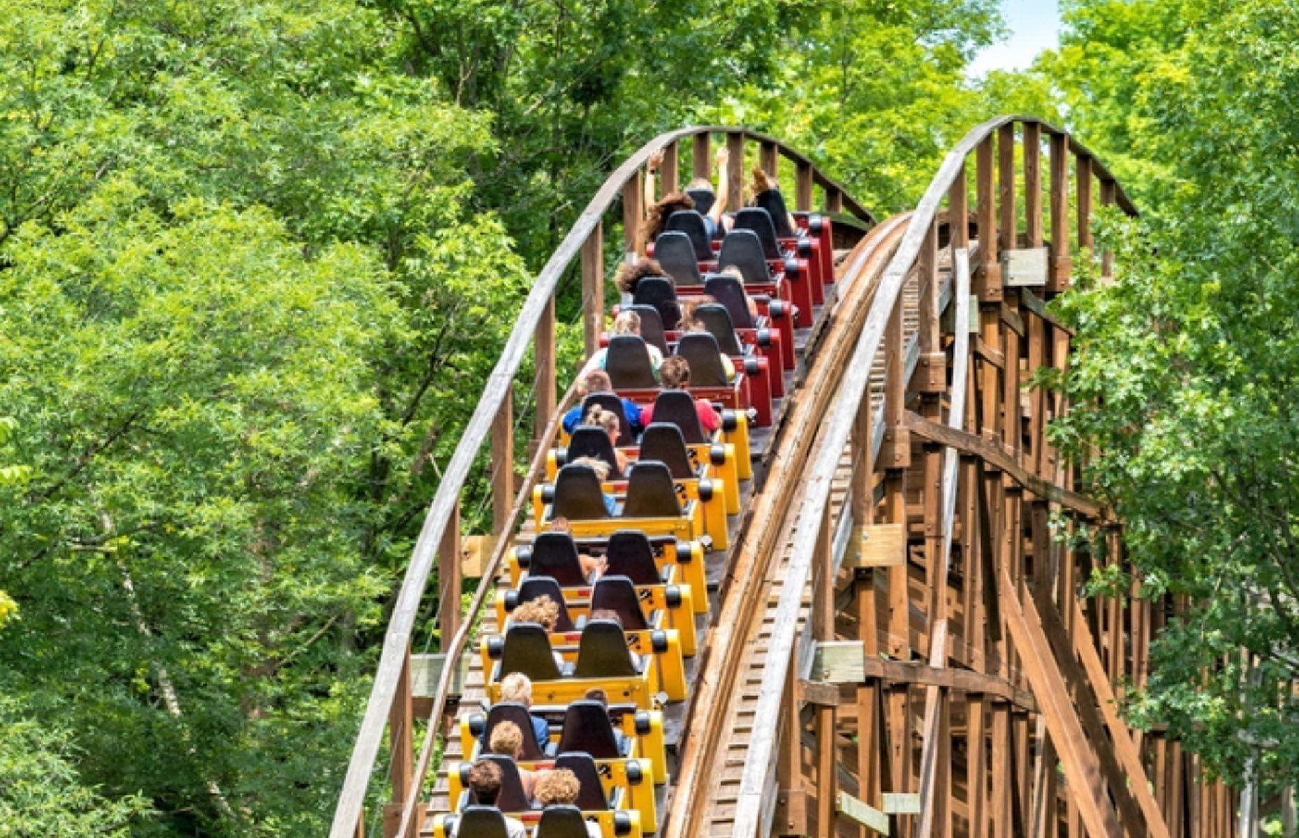 <p>Aptly named The Beast, this is the longest wooden roller coaster in the world stretching for a staggering 7,361 feet. Set on 35 acres of woodland, it was the longest and fastest roller coaster in the world when it opened back in 1979.</p>  <p>The Beast has two vertical drops each over 135 feet, eight banked turns, a 125 feet tunnel and a 540° helix tunnel. It has held the longest wooden coaster mantle for over 40 years now.</p>