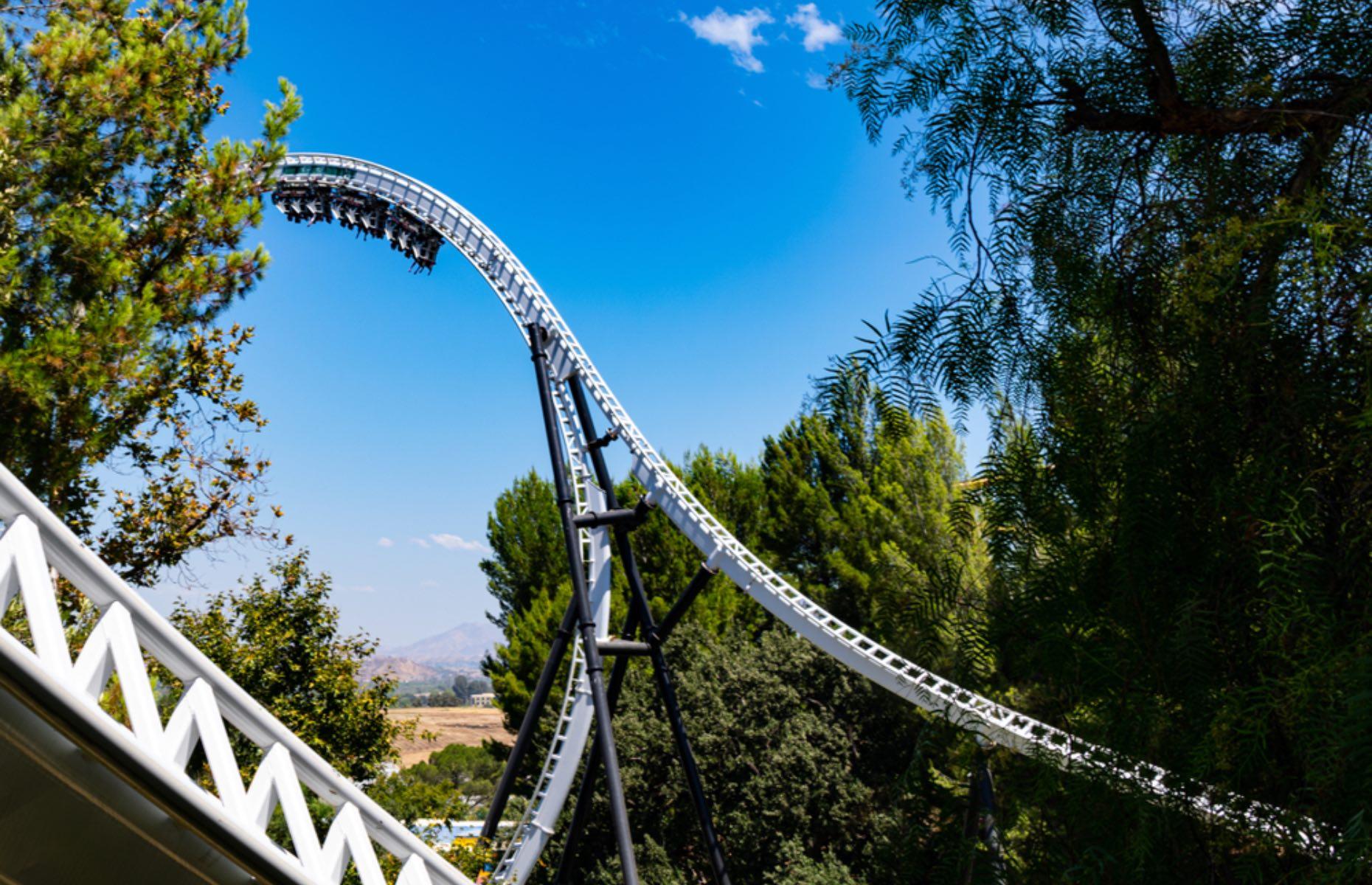 <p>Setting world records since it launched in 2013, Full Throttle is as unique as it is scary. It has the tallest vertical loop in the world, and at 160 feet it's the only coaster in the world to have a track on the outside of the loop.</p>  <p>Full Throttle also features three separate 70-mile-per-hour launches. One, in particular, propels riders backward around the massive loop, stops midway, switches direction mid-loop, and dives back into a tunnel towards the 'top hat' (the outside of the track).</p>