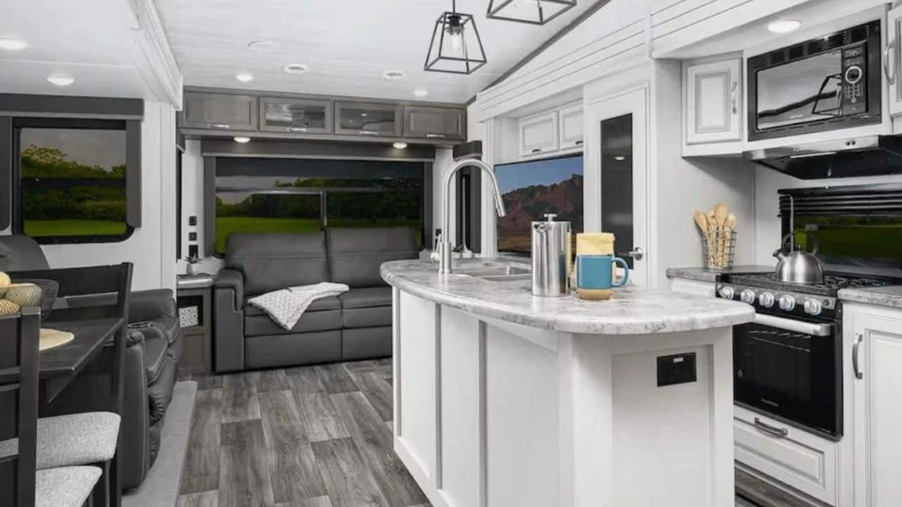 <p>There are many benefits to upgrading from a travel trailer to a fifth-wheel RV, especially for full-time RV living. Fifth-wheel owners report more effortless towing, increased living space, and luxurious amenities. The best rear kitchen fifth wheels maximize the floor plan with the kitchen in the back of the unit, but is that the right choice for your camping style?</p> <p>Here are some of the best rear kitchen fifth wheels to check out! </p>
