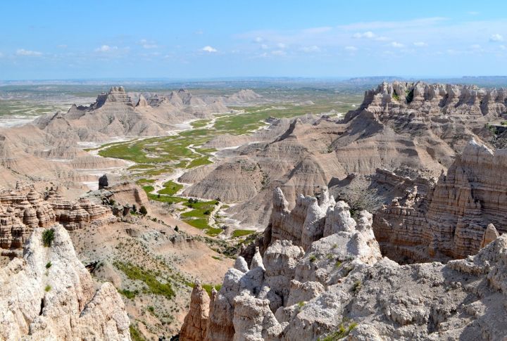 <p>Delve into the heart of the Badlands, where rugged terrain and striking rock formations reveal a treasure trove of dinosaur fossils. Take a guided tour along hiking trails to witness firsthand the fragments of these creatures that once roamed these lands.</p>