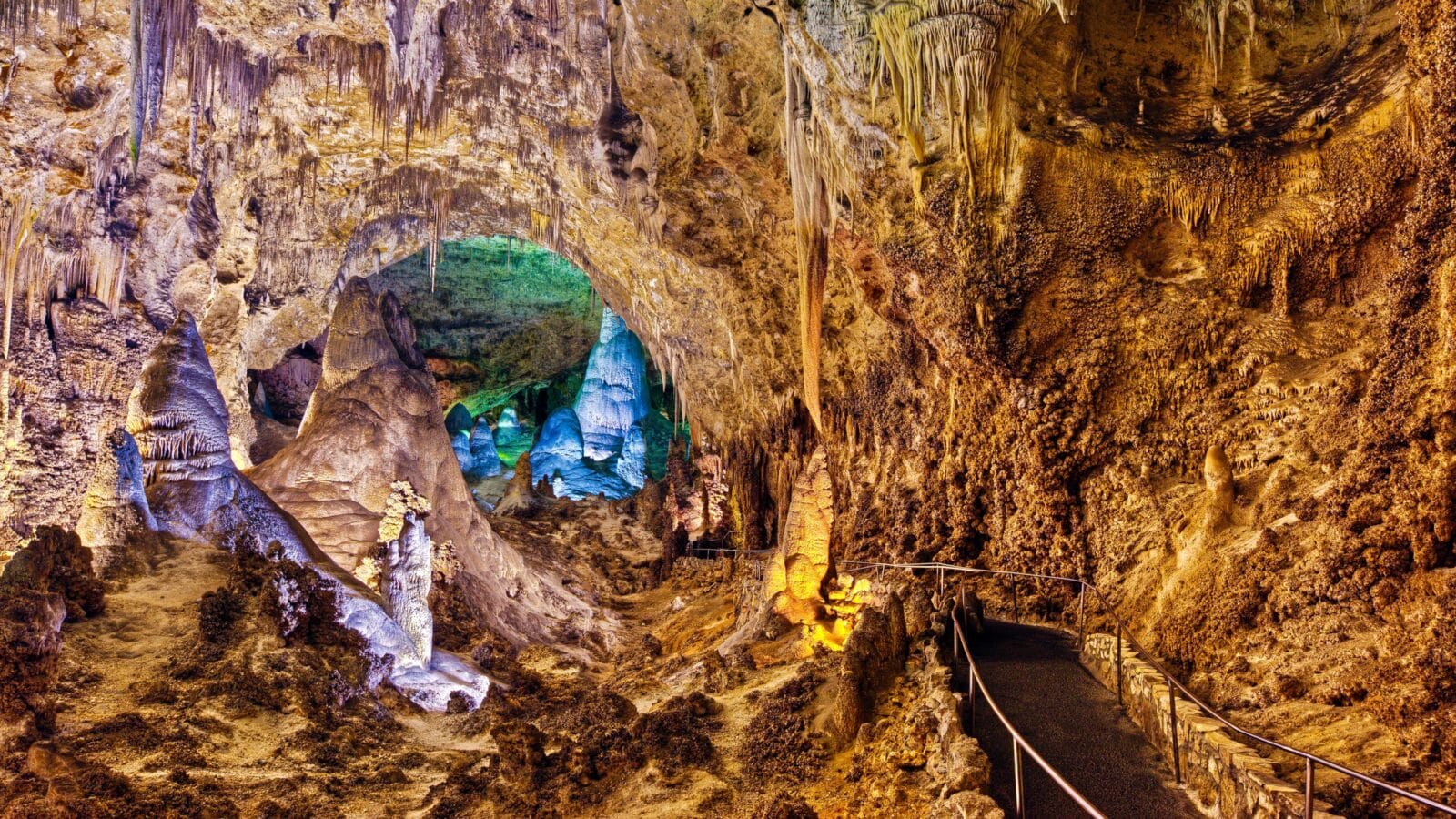 <p>Home to a network of over one hundred caves, this New Mexico national park boasts gorgeous displays of stalactites and massive chambers connected by trails you can hike with your family. Several caves are open to the public and ready for your exploration.</p><p>If you’re exploring the park without a guide, take the famous Big Room Trail, which descends into the depths of the earth via the steep Natural Entrance. From there, you can better look at the spectacular geological formations offered by the 3.1-hectare Big Room and meet the Devil’s Spring, the Iceberg Rock, and the Whale’s Mouth.</p>