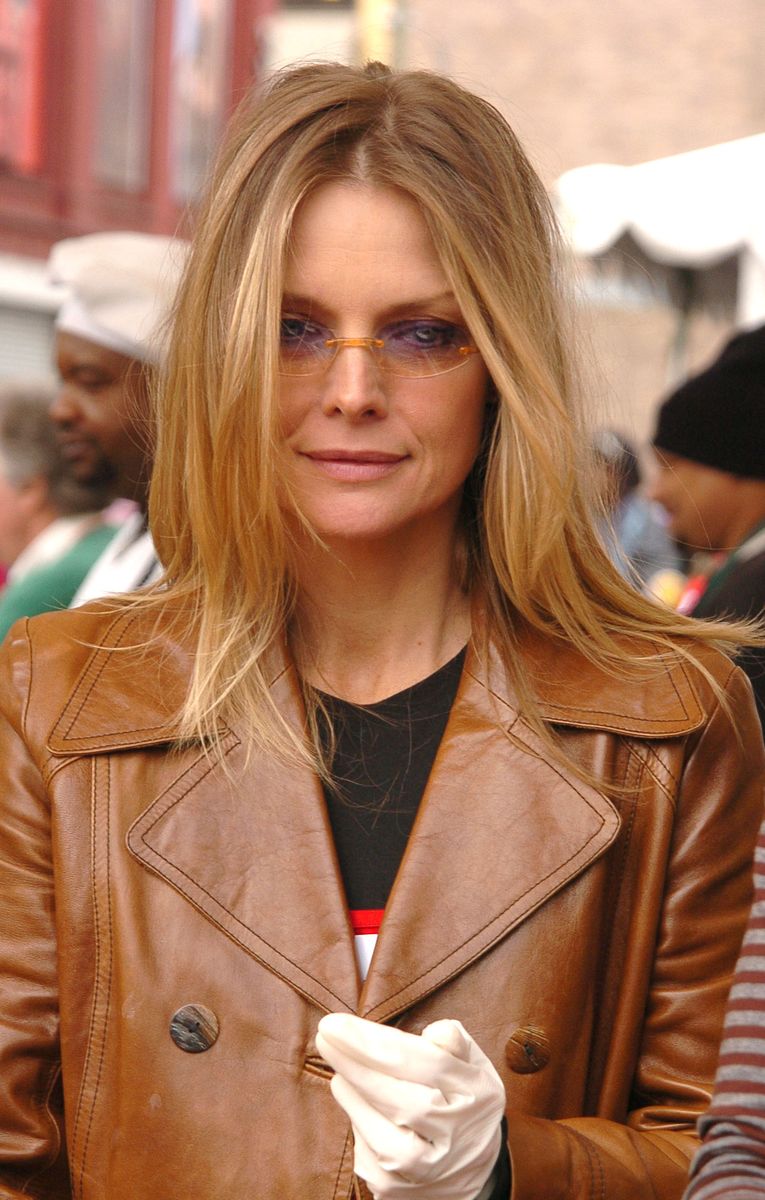 <p>With a bold tan leather jacket, auburn-tinged shades, and a face-framing haircut, Pfeiffer was camera-ready while enjoying the Los Angeles Mission Christmas Party.</p>