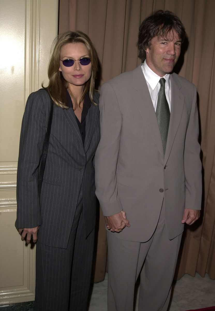 <p>Another day, another pair of fabulous shades. The actress paired a sleek black pair with a pinstriped suit while heading out with her husband, TV writer David E. Kelley.</p>
