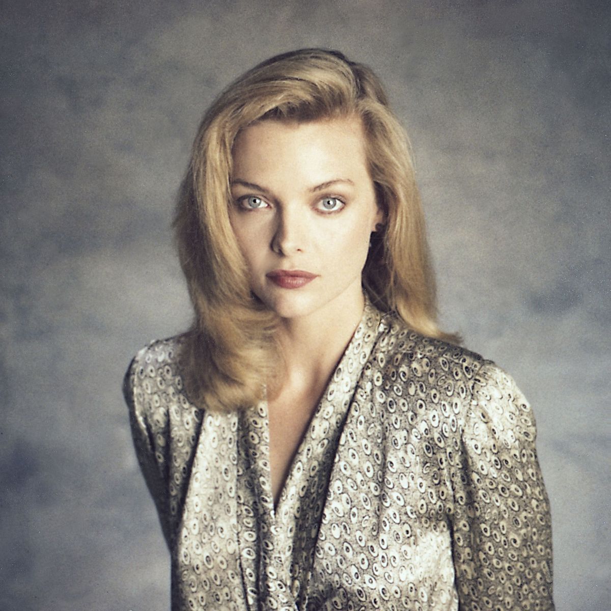 <p>She sported a printed silk blouse for a Los Angeles portrait session in the late '80s. </p>