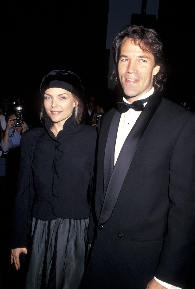 <p>Pfeiffer paired a velvet beret-style hat with a frilly sweater and a pleated taffeta skirt for the premiere of Martin Scorsese's <em>The</em> <em>Age of Innocence</em>. She kept her makeup and hair simple that night, wearing a pearly pink lip and a subtle swipe of black eyeliner.</p>