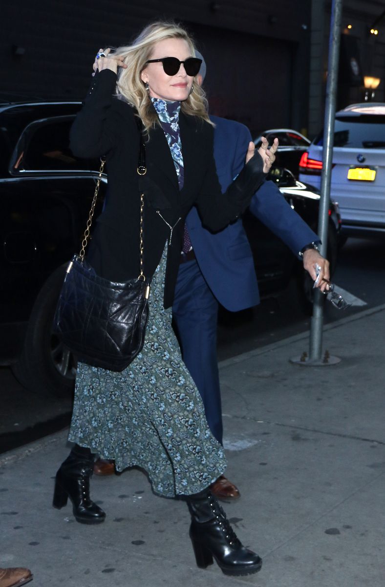 <p>Pfeiffer showed that her street style is top-notch when she was snapped in NYC donning a printed mock neck floral dress, lace-up boots, a fitted blazer, and oversized cat-eye shades.</p>