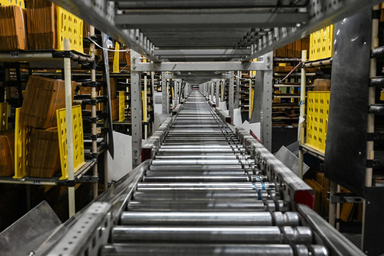A general view of a conveyor belt at a fulfilment centre of an indigenous e-commerce company 'Flipkart' at Haringhata around 65 Kms northwest of Kolkata on August 3, 2023. (Photo by DIBYANGSHU SARKAR / AFP) (Photo by DIBYANGSHU SARKAR/AFP via Getty Images)