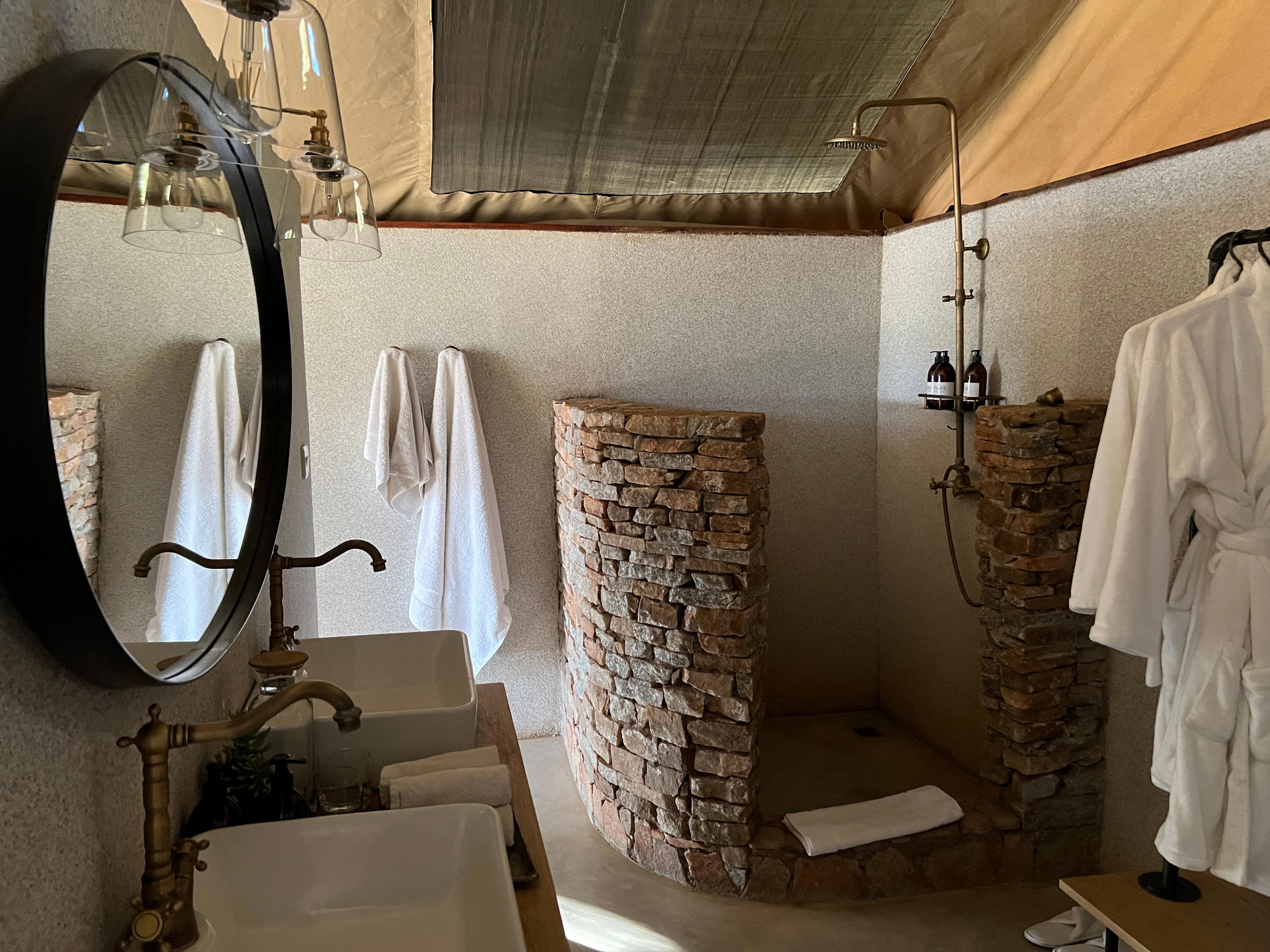 <p>The shower's hot water was great and we had double sinks we could get ready at.</p><p>Another perk of the lodge is that we could have staff do our laundry every day, which meant we could pack less clothing.</p>