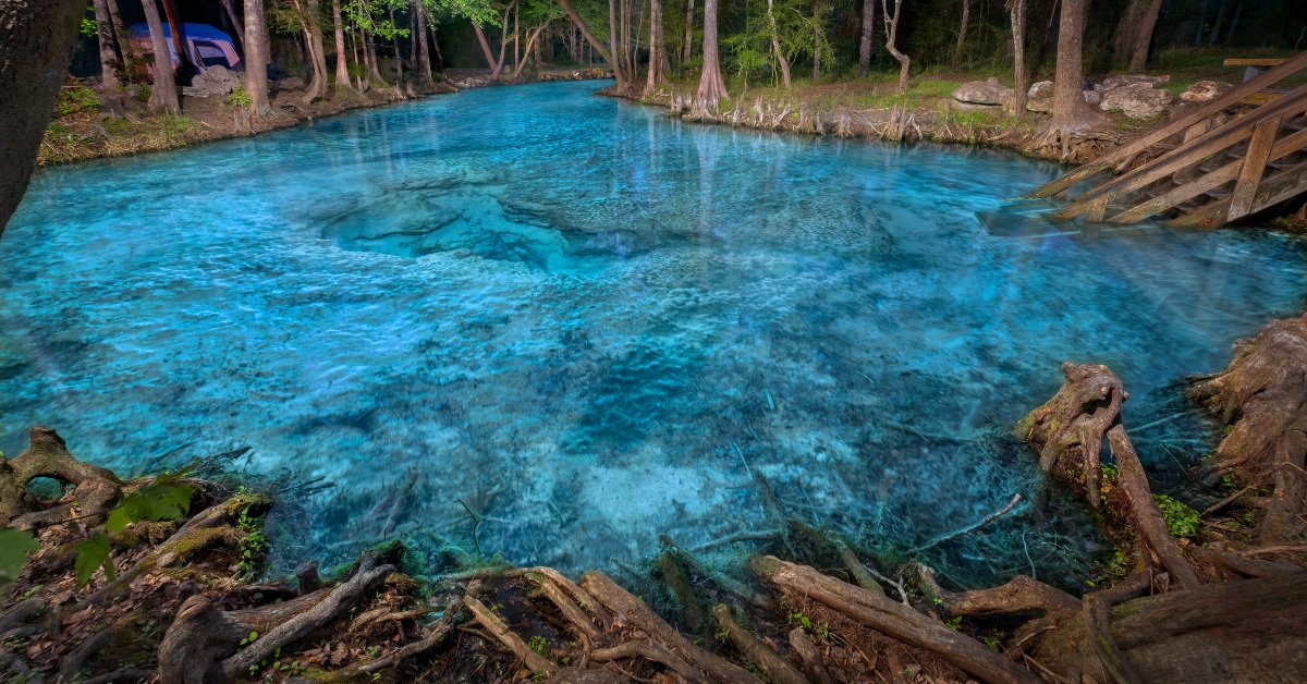 <p> Ginnie Springs in North Florida can get crowded, especially on weekends and holidays. However, camping alongside beautiful natural springs is worth it, especially if you want a good party atmosphere. </p> <p> Popular activities include swimming and diving in the springs, tubing the Santa Fe River, volleyball, grilling, and picnicking. </p> <p> Ginnie Springs is one of the most affordable destinations on this list. </p>