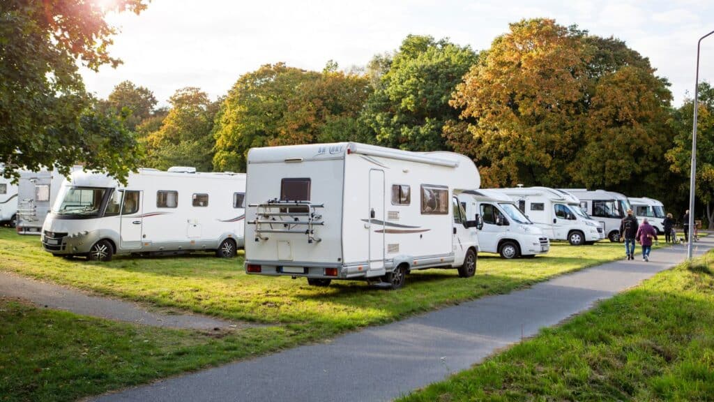 <p>After purchasing your RV, you need to find somewhere to park it. Generally, camping fees are the most considerable additional cost of RV living.</p><p>The average cost to park at an RV campsite is $25 to $60 per night. However, luxury sites can cost up to $100. </p><p><strong>Therefore, the cost for RV site rental for a month is approximately $500 to $1,200.</strong></p><p>You can cut the costs, though! For example, investing in a portable generator will allow you to camp without a hookup. Alternatively, camping with friends can minimize costs.</p><p>This is what our RVer had to say about this:</p><p>“I’ve helped cousins with home renovations from San Diego to Tennessee in exchange for a free place to camp. Sometimes, they even offered a roomy shower or a night in a non-RV bed!”</p>