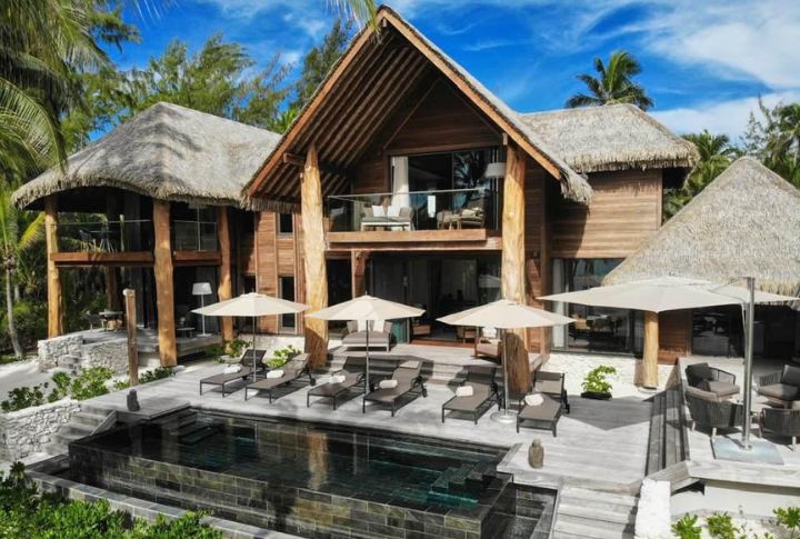 <p>This Eco-luxury Polynesian escape will cost you $1,500/night, but it’ll be worth every penny! Dive into crystal-clear waters rife with marine life or unwind in your luxurious overwater bungalow with a glass floor. Guests will love this location, thanks to its locally sourced cuisine and eco-adventures.</p>