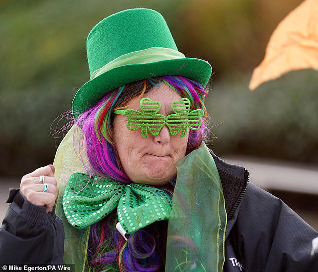 Cheltenham revellers don 40 shades of glamorous green and raise a pint ...