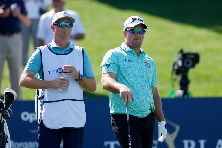 Ryan Fox and his caddie prepare for a shot on the 18th tee during the first round of THE PLAYERS Championship on the Stadium Course at TPC Sawgrass on March 14, 2024 in Ponte Vedra Beach, Florida. (Photo by Mike Ehrmann/Getty Images)