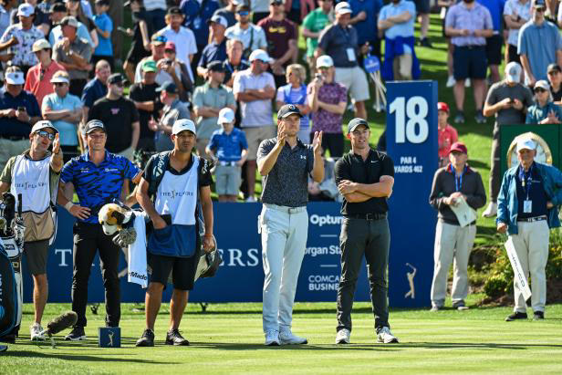PONTE VEDRA BEACH, FLORIDA - MARCH 14: Rory McIlroy of Northern Ireland reacts and speaks to Jordan Spieth about where his tee shot crossed into the water on the 18th hole during the first round of THE PLAYERS Championship on the Stadium Course at TPC Sawgrass on March 14, 2024, in Ponte Vedra Beach, Florida. (Photo by Keyur Khamar/PGA TOUR via Getty Images)