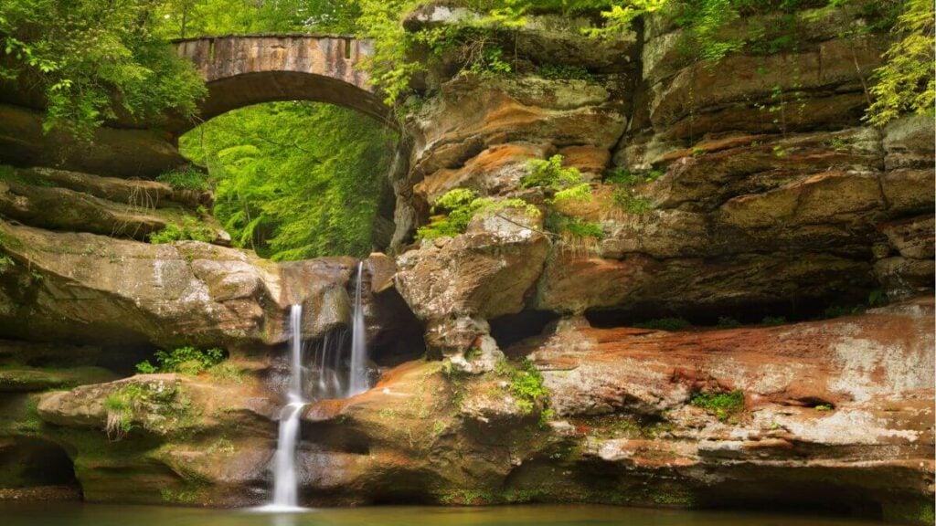 <p>If you want a <a href="https://www.thewaywardhome.com/12-solo-road-trip-hacks-for-a-safe-and-exciting-adventure/">relaxing road trip</a>, the Hocking Hills Scenic Byway is for you. The Ohio-based trail is 26 miles long and filled with stunning natural visuals, especially during autumn, when the gorgeous foliage is formed. </p><p>It’s not a long drive, so stop at Conkle’s Hollow Upper Rim Trail. You can also stay in the cave, which has been transformed into a cabin. </p>