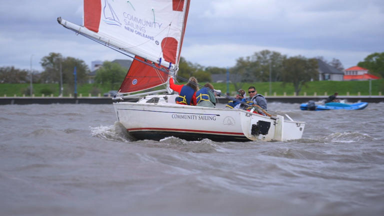 Blind sailors overcome challenges to establish a pioneering sailing program on Lake Pontchartrain, navigating by sound cues