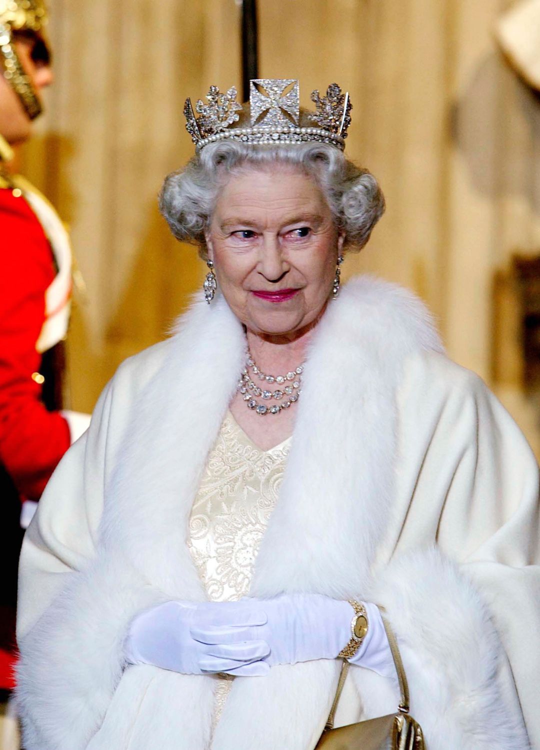 <p>                     Queen Elizabeth II was no stranger to glamour, and this picture of her wearing a remarkable fur-trimmed robe is complete proof of that. For The State Opening of Parliament in 2002, the late Queen paired her robe and embroidered cream satin dress with The State Diadem tiara and a layered diamond necklace.                   </p>