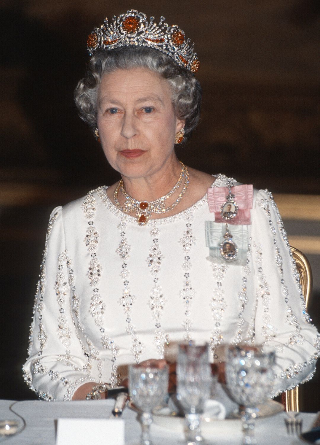 <p>                     The Burmese Ruby tiara was one of the late Queen's most decorative and colourful headpieces. Pictured here at a banquet during a state visit to Paris in 1992, Her Majesty wore the iconic tiara, designed to resemble a wreath of roses with silver, diamonds, gold and rubies. There is a touching reason the Queen had this Burmese Ruby tiara made and why specifically it holds 96 rubies in total.                   </p>