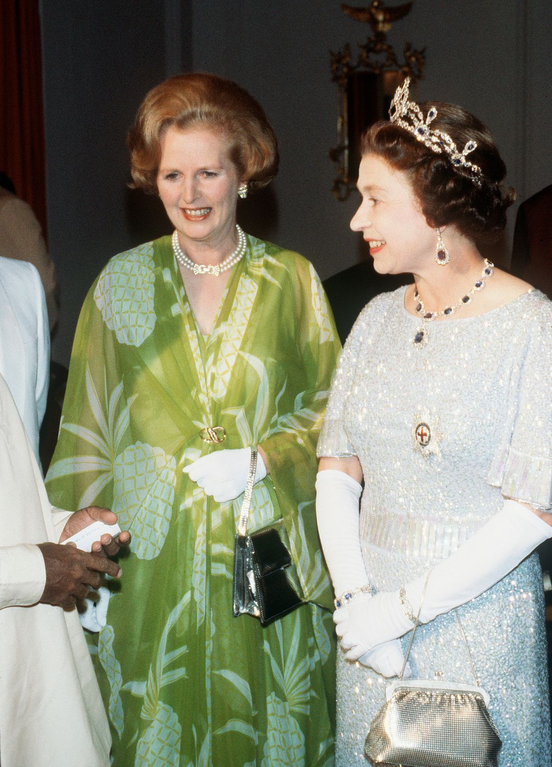<p>                     During a visit to Zambia for the Commonwealth conference in 1979, Queen Elizabeth II was pictured next to the then Prime Minister Margaret Thatcher. She wore her diamond and sapphire tiara with its matching earring and necklace set, an extremely elegant choice as it complemented her glittering baby blue evening gown wonderfully.                   </p>