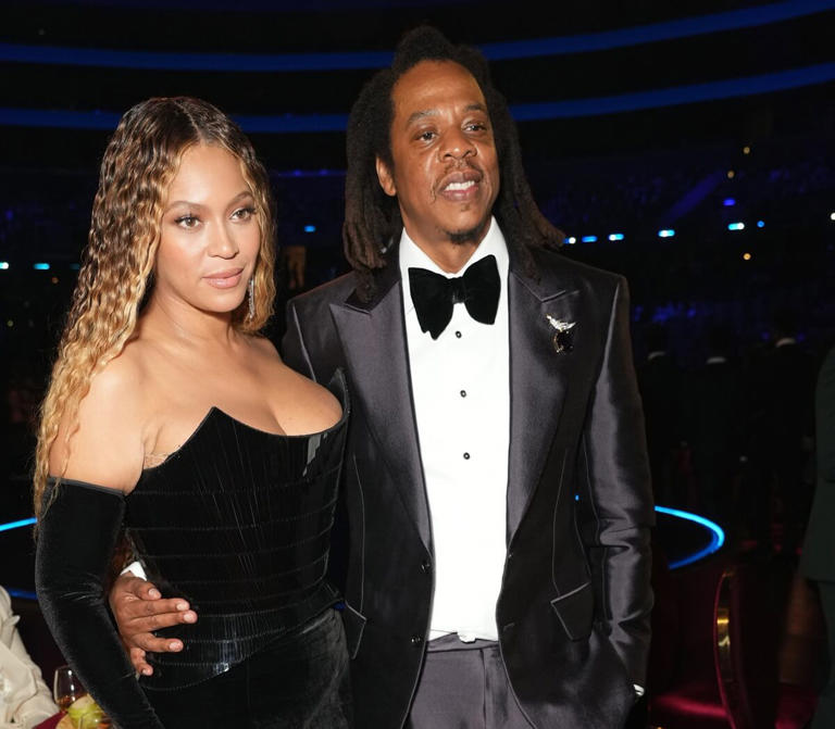 Beyoncé and Jay-Z pose for a photo together at the 65th GRAMMY Awards | Kevin Mazur/Getty Images for The Recording Academy