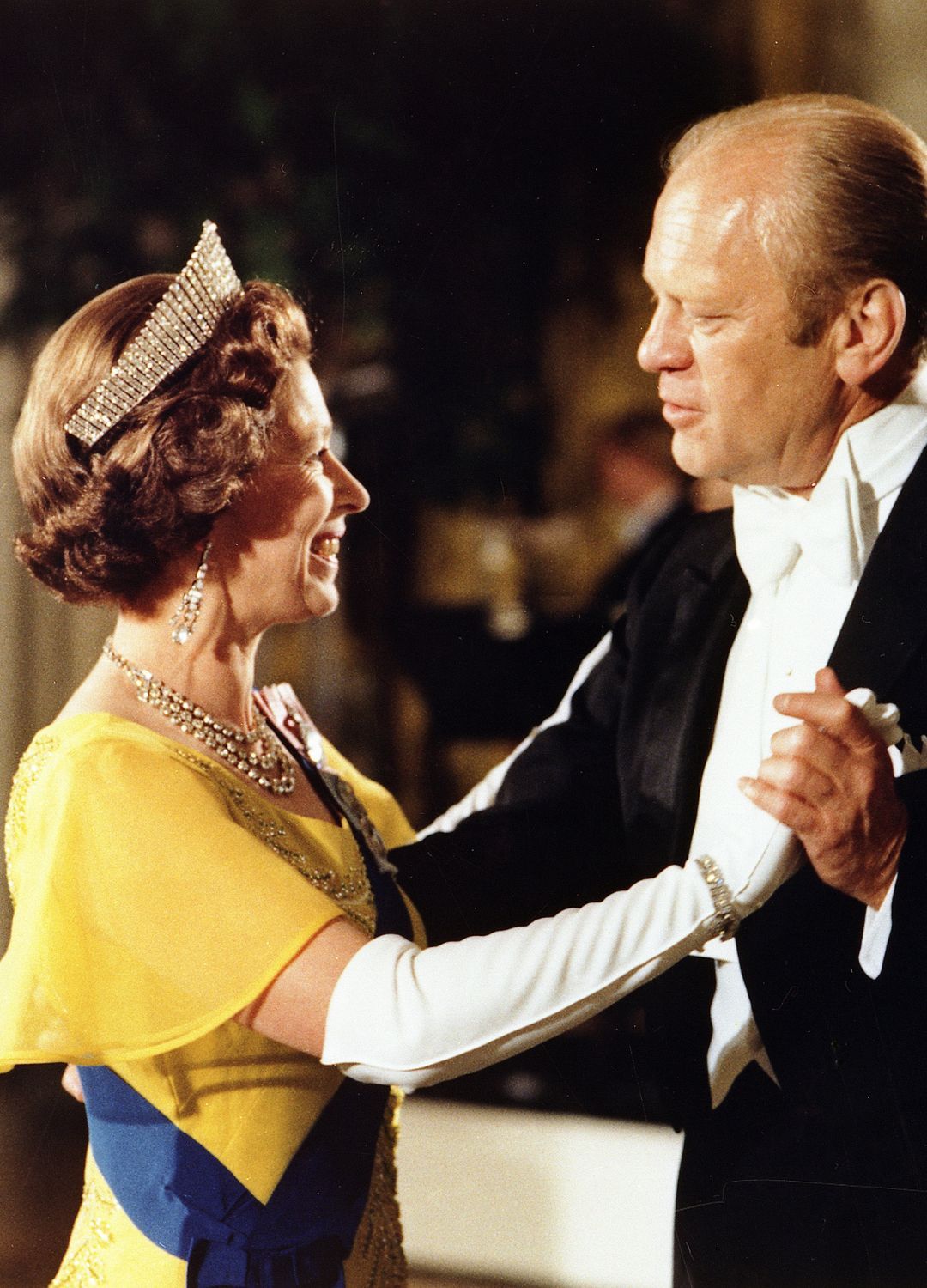 <p>                     Dancing with the 38th President of the United States, Gerald Rudolph Ford Jr. called for a particularly magnificent tiara, and Queen Elizabeth II delivered just that. Whilst attending a ball at the White House during the 1976 Bicentennial Celebrations of the Declaration of Independence, Her Majesty wore the Queen Alexandra Kokoshnik Tiara which looked decadent with her buttercup yellow dress and white evening gloves.                   </p>