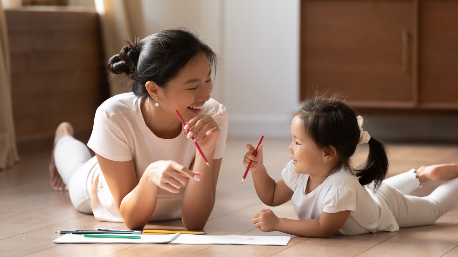 image credit: fizkes/shutterstock <p>Encourage your child to tell stories through their drawings. They can illustrate a day in their life or an entirely imagined tale. Seeing your child’s stories come to life through art can be awe-inspiring and encourages narrative skills and artistic development.</p>